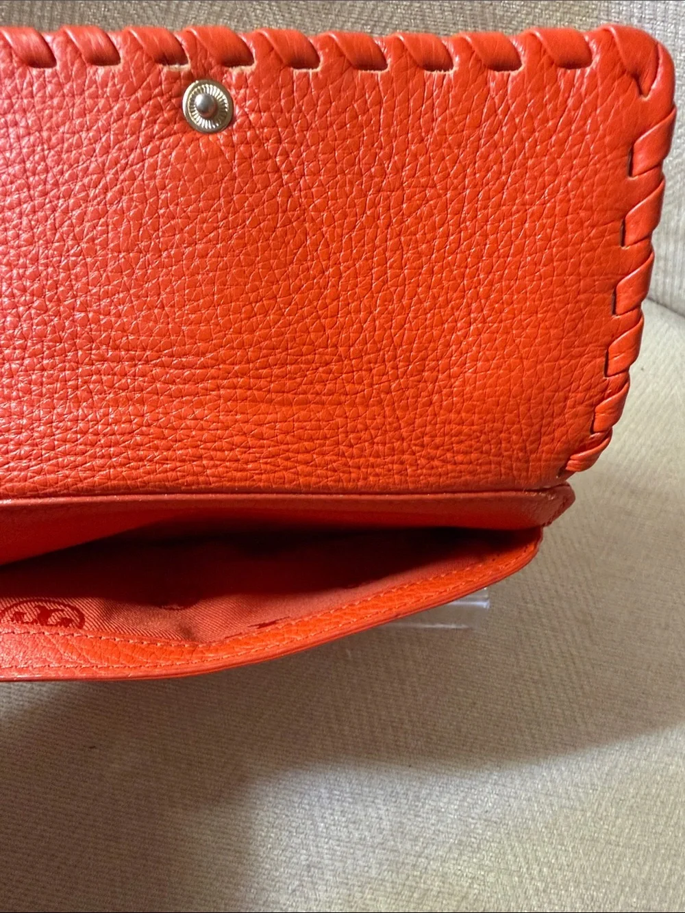 Tory Burch Orange Leather Wristlet with Logo Medallion